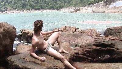 Muscular and twink latino pound each other on the beach