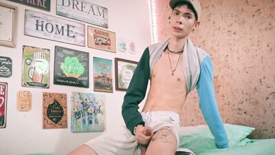 Sport Twink Magic C Jerking His Big Cock Through The Side of His Shorts