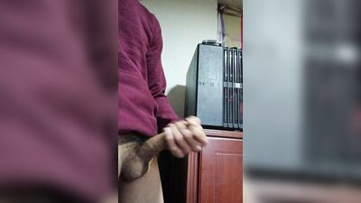 Latina cums on her cock in front of her computer