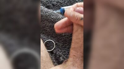 Playing with my uncut cock, ring around my glans. Squirting lube in my dick and jerking off until I come