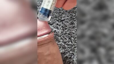 Playing with my uncut cock, ring around my glans. Squirting lube in my dick and jerking off until I come