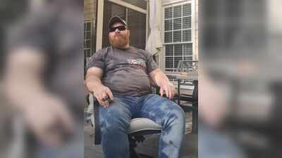 Smoking a good cigar on the deck
