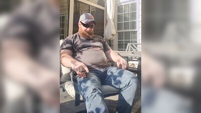 Smoking a good cigar on the deck