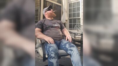 Smoking a good cigar on the deck