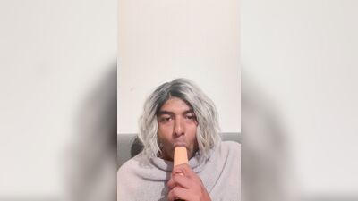 Crossdresser blows her dildo
