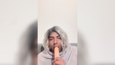 Crossdresser blows her dildo