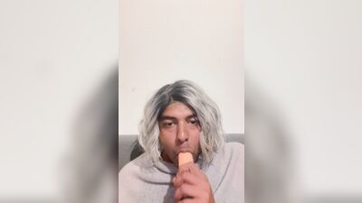 Crossdresser blows her dildo
