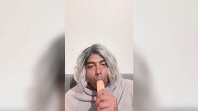Crossdresser blows her dildo
