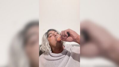 Crossdresser blows her dildo