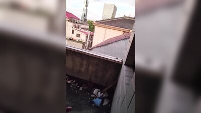 Naked wandering around a broken house on the side of a busy road and masturbating