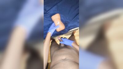 Larino boy Getting his dick hard while using gloves with precum