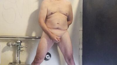 Old guy naked and masturbating in men's room