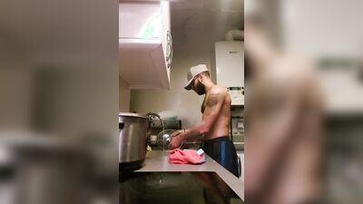 Muscular man has romantic sex in the kitchen