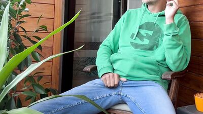 Sitting on my balcony and jerk my huge dick and shot my load
