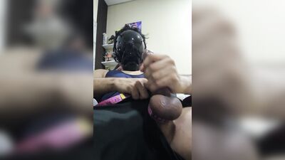 Masked guy shows off his big brown cock