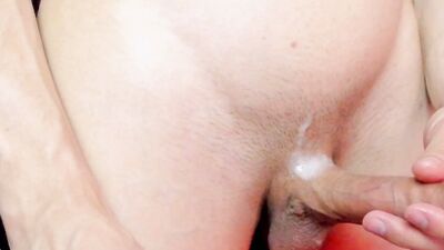 Cute young man cums in close-up