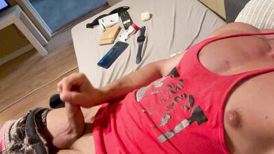 Laying on my favourite sofa and jerking off.