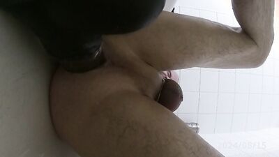Fucking myself with Chance XXL deep in the shower with a flat cage with long urethra tube