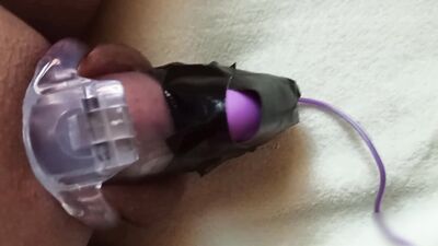 Locked in CB cage can't cum, vibrator ejaculated