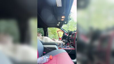 Edging my cock in a public park with truck door open.