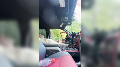 Edging my cock in a public park with truck door open.