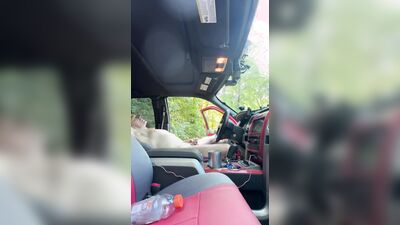 Edging my cock in a public park with truck door open.