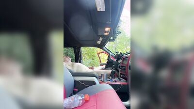 Edging my cock in a public park with truck door open.