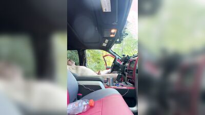 Edging my cock in a public park with truck door open.
