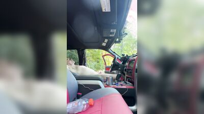 Edging my cock in a public park with truck door open.