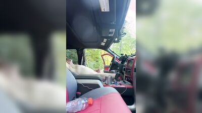 Edging my cock in a public park with truck door open.