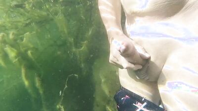 Very hot underwater jerking off in a dreamlike lake in the mountains