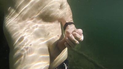 Very hot underwater jerking off in a dreamlike lake in the mountains