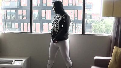 spandex & wetsuit at hotel window