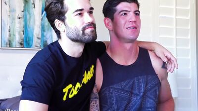 Two horny gay lads are having sex on the couch