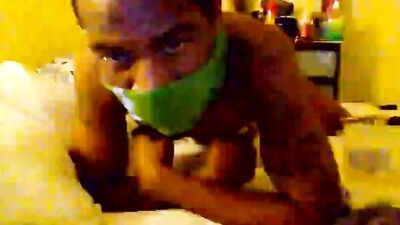 Masked lad plays with his ass in front of the camera