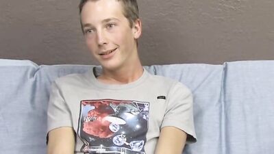 Skinny twink is stroking his dick in front of the camera
