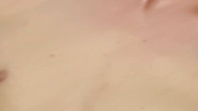 Skinny twink is stroking his dick in front of the camera