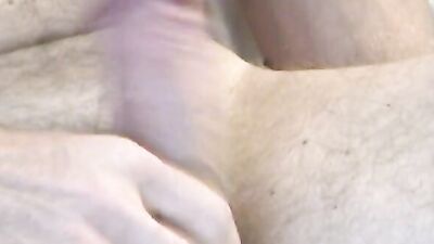 Amateur bloke is stroking his schlong in front of the camera