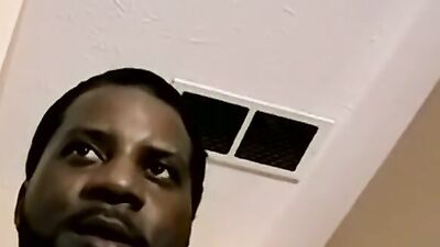 Amateur black fella is stroking his dong in front of the camera
