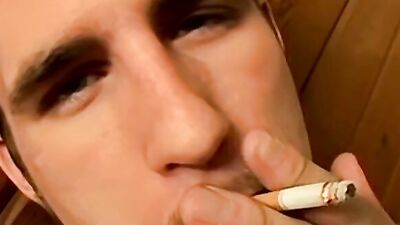 Straight chap jerks his prick while he's smoking a cigarette