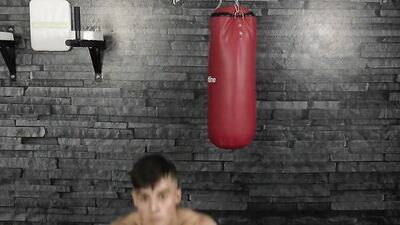 Handsome amateur chap is flexing in front of the camera