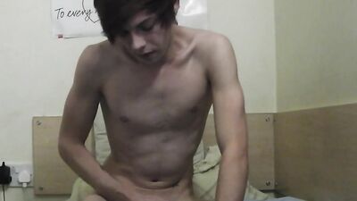 Amateur twink is stroking his pecker in front of the camera