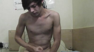 Amateur twink is stroking his pecker in front of the camera