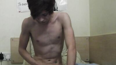 Amateur twink is stroking his pecker in front of the camera