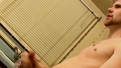 Amateur straight bloke is jerking his prick in the kitchen