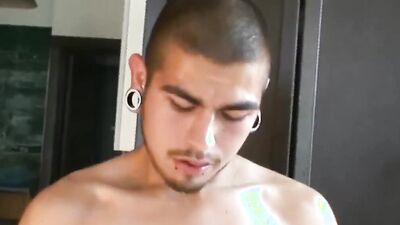 Amateur Latino is playing with his prick in front of the camera