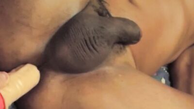 Amateur masked gay dude is playing with his gummy dildo