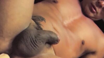 Amateur masked gay dude is playing with his gummy dildo