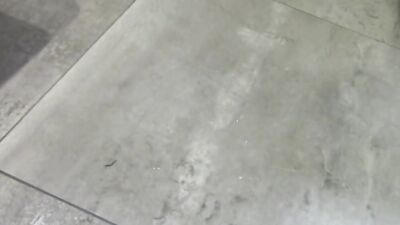 Betsy Blue is stroking his cock in front of the camera