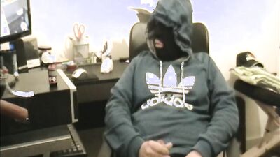 Masked dude is stroking his prick in front of the camera